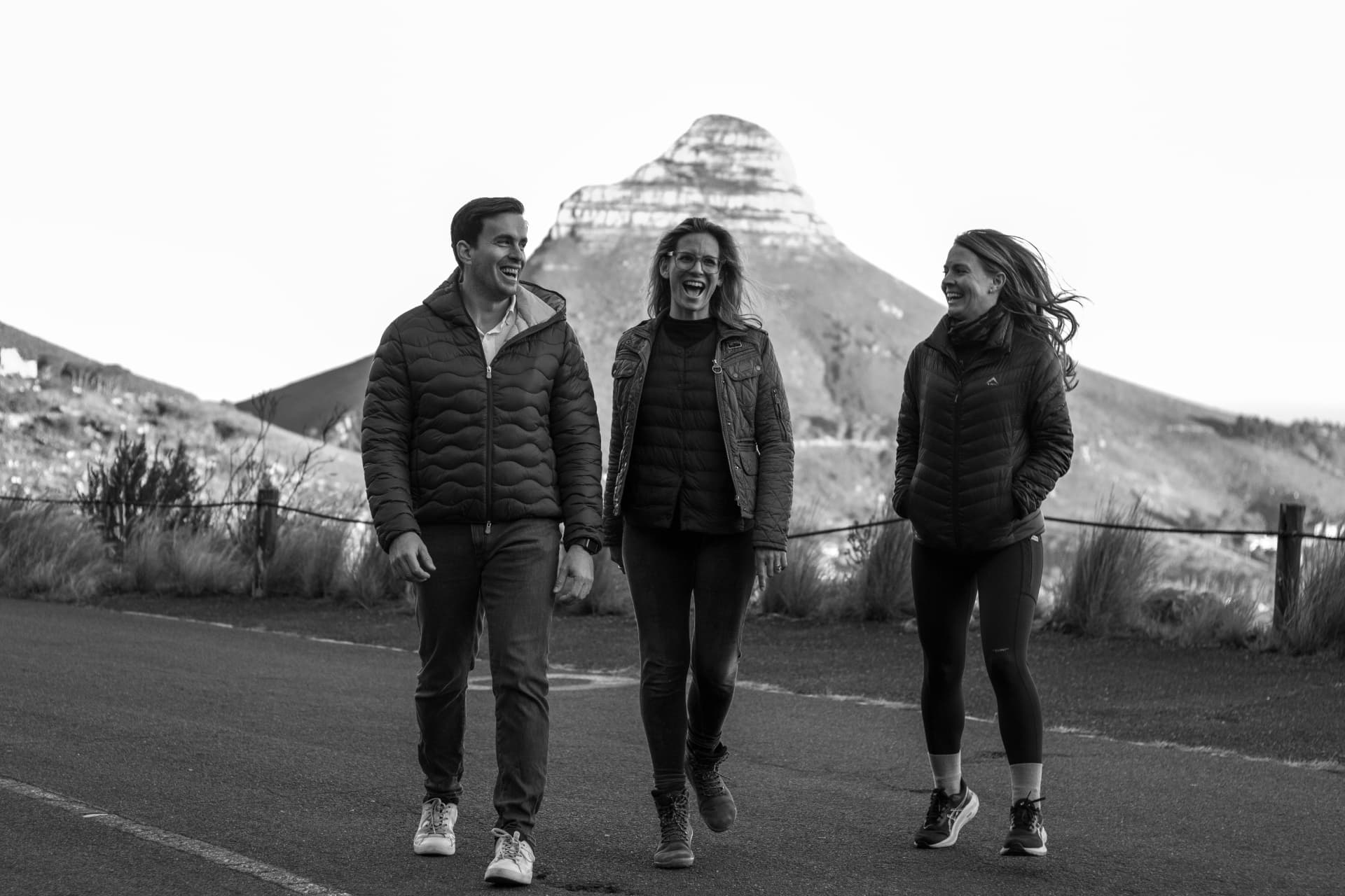 The Kinjani team walking together below Lion's Head