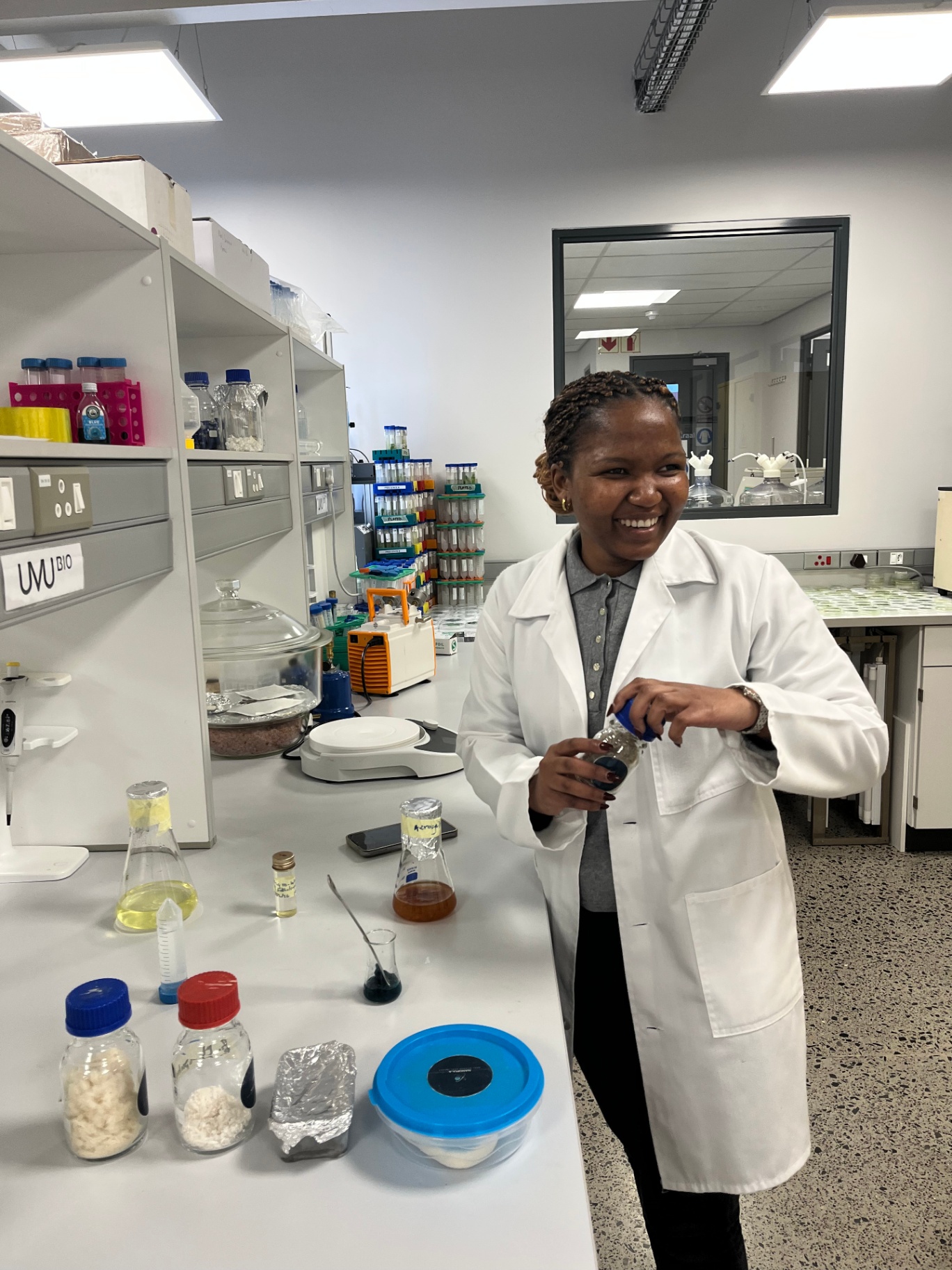 A scientist working with samples in a laboratory
